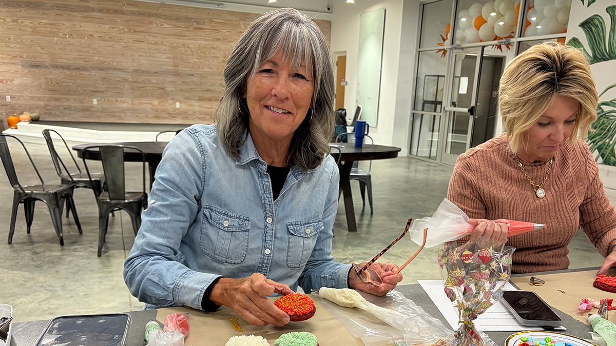 Members decorating holiday treats and cookies